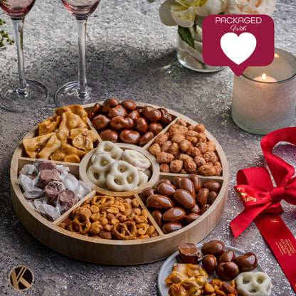 Chocolate Covered Pretzels, Nuts & Candy Gift Basket (7 Assortments) Sweet Treats in Reusable Round Wooden Tray Ribbon Kosher